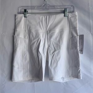 Athleta Ultimate Stash 7” Bike Shorts White NWT Size L Pockets